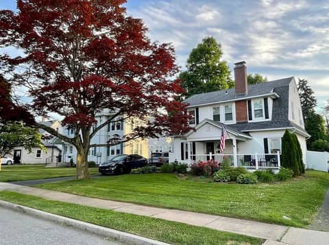 Front of the house on Jessamine St in West Hartford, with a covered porch.