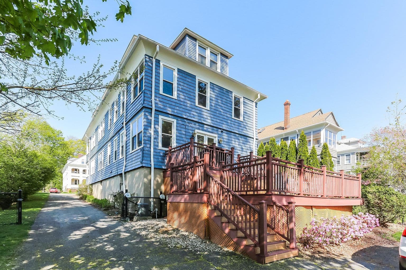 Multifamily house on Grennan Rd in West Hartford, with a deck.