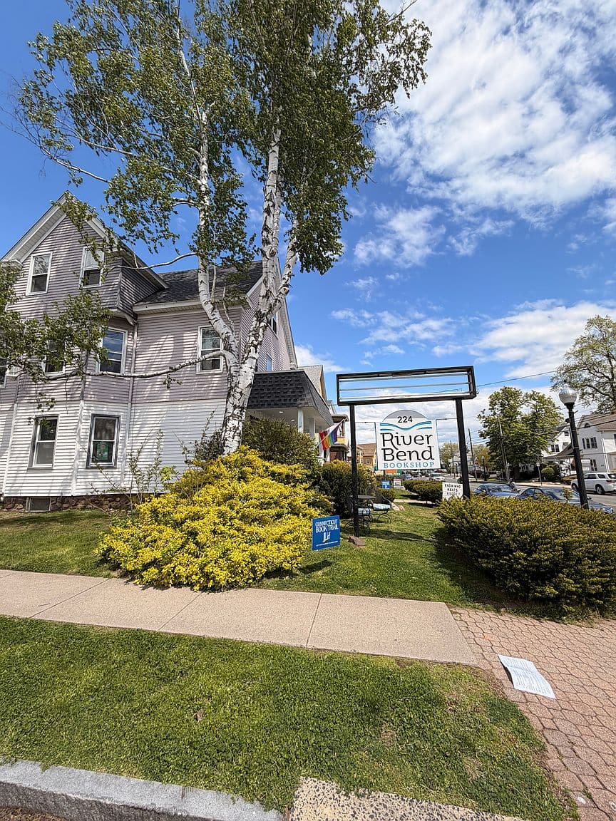 Mixed-use building on Park Rd in West Hartford, with a ground-floor shop and apartments above.